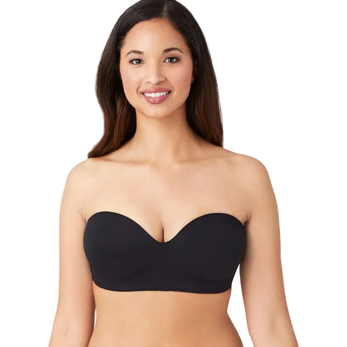 Woman wearing a black Wacoal Red Carpet strapless bra on a white background showing the front view.