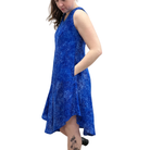Woman wearing a blue dress on a white background