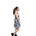 Woman wearing a floral dress on a white background