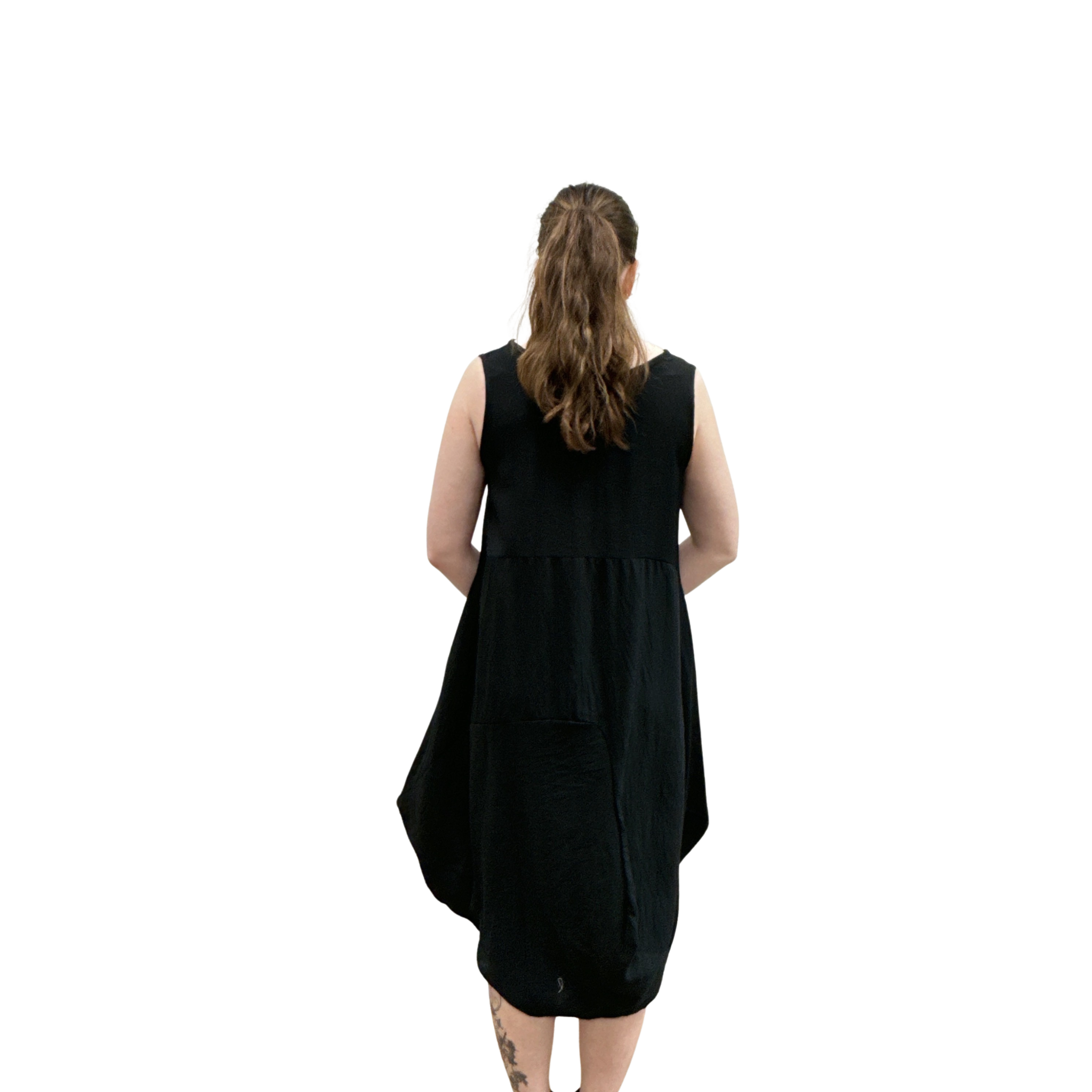 Person wearing a black sleeveless dress on a white background
