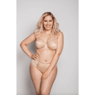 A woman wearing a beige underwire full cup bra with embroidery detailing.