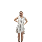 Woman wearing a sleeveless dress with a white background