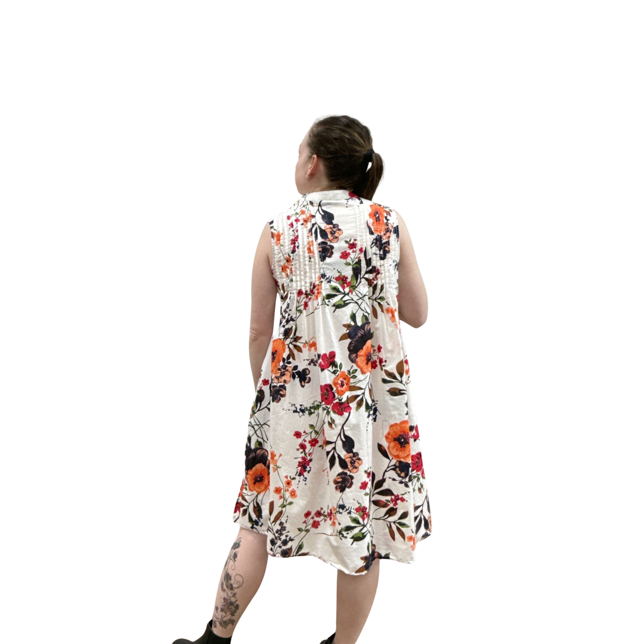 Woman wearing a floral dress on a white background