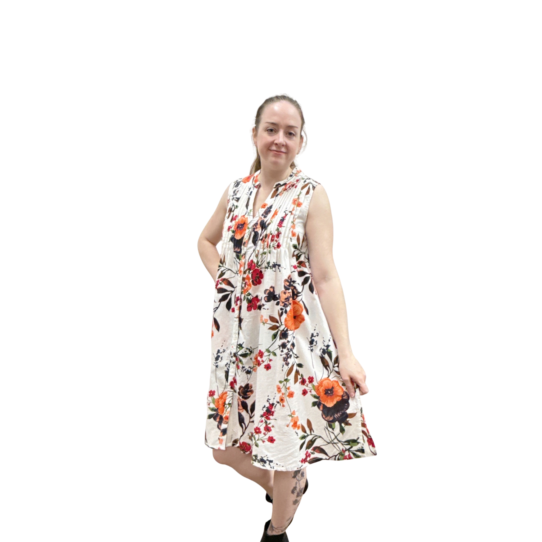 Woman wearing a floral dress on a white background