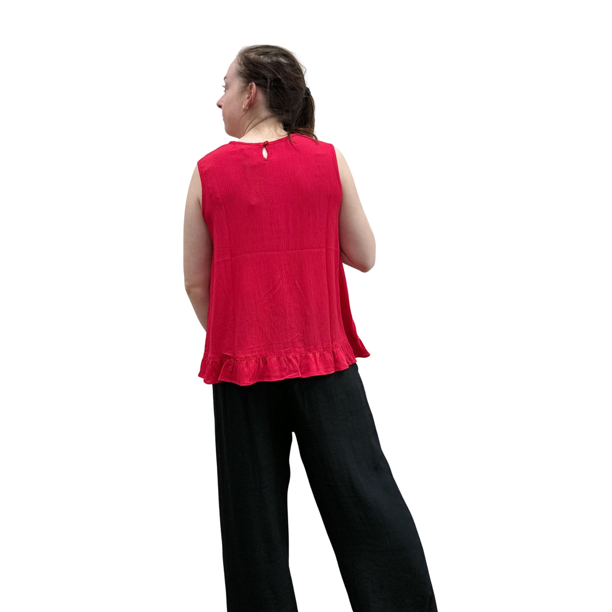 Person wearing a red sleeveless top and black pants on a white background