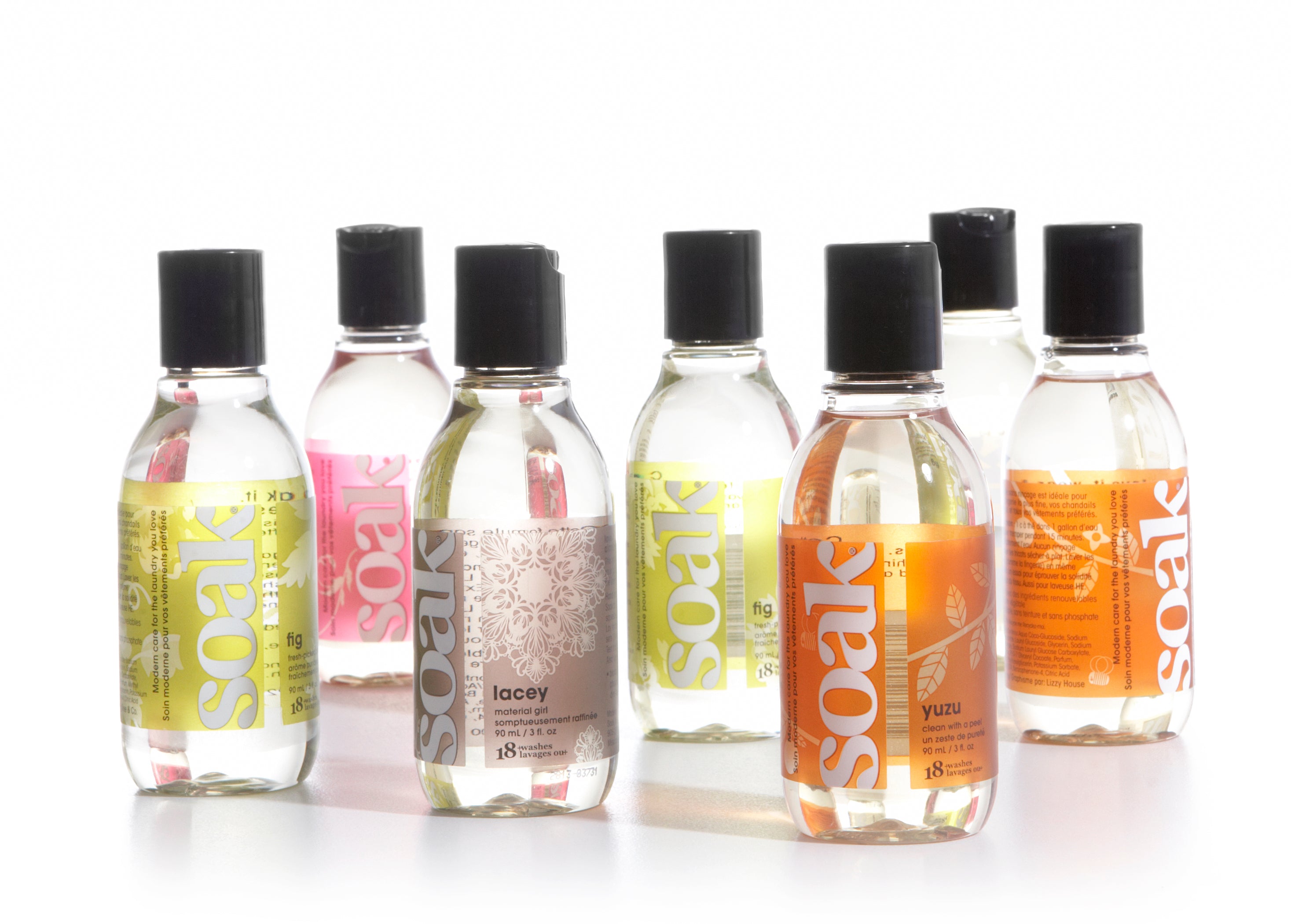 Set of Soak laundry detergent bottles on a white background