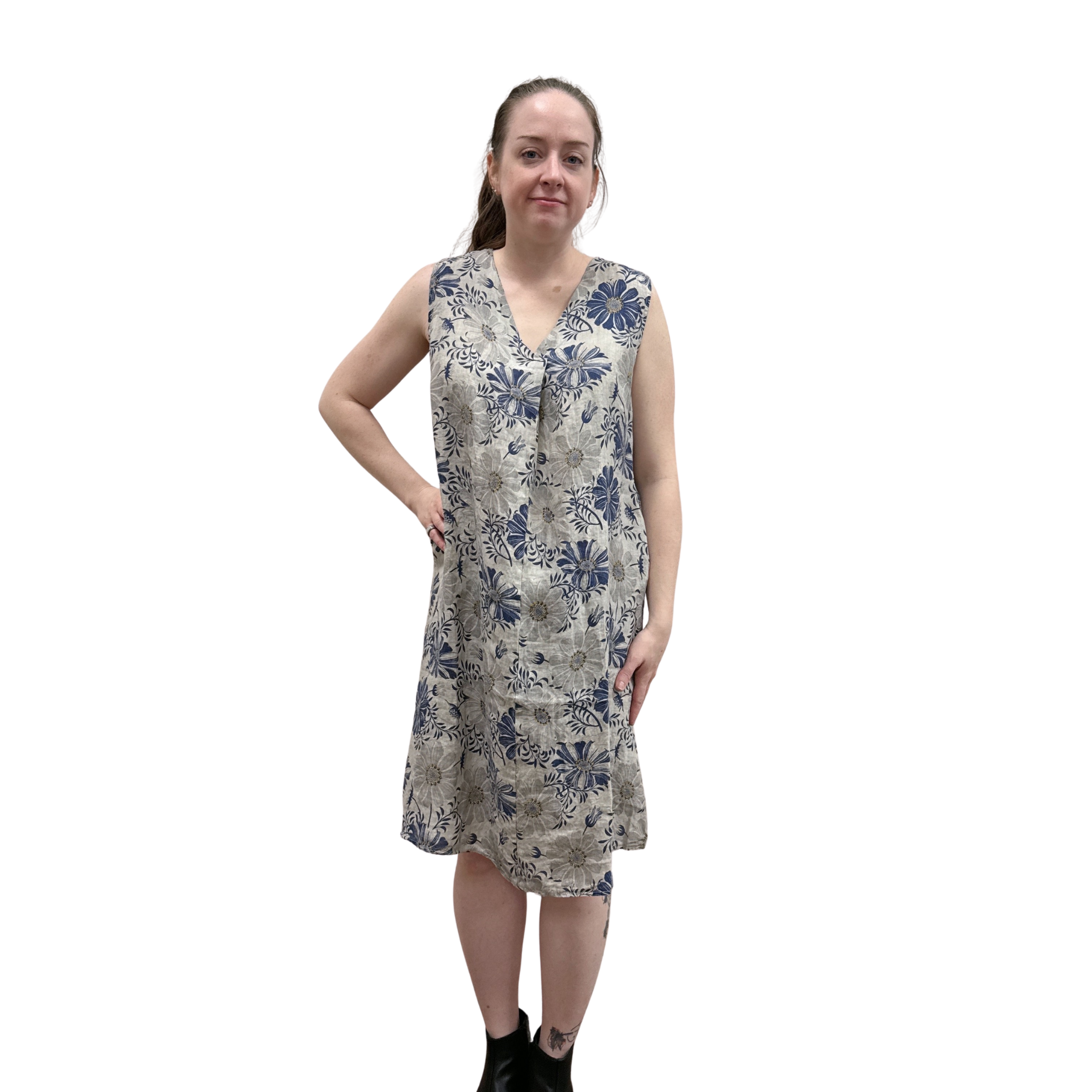 Woman wearing a floral dress on a white background