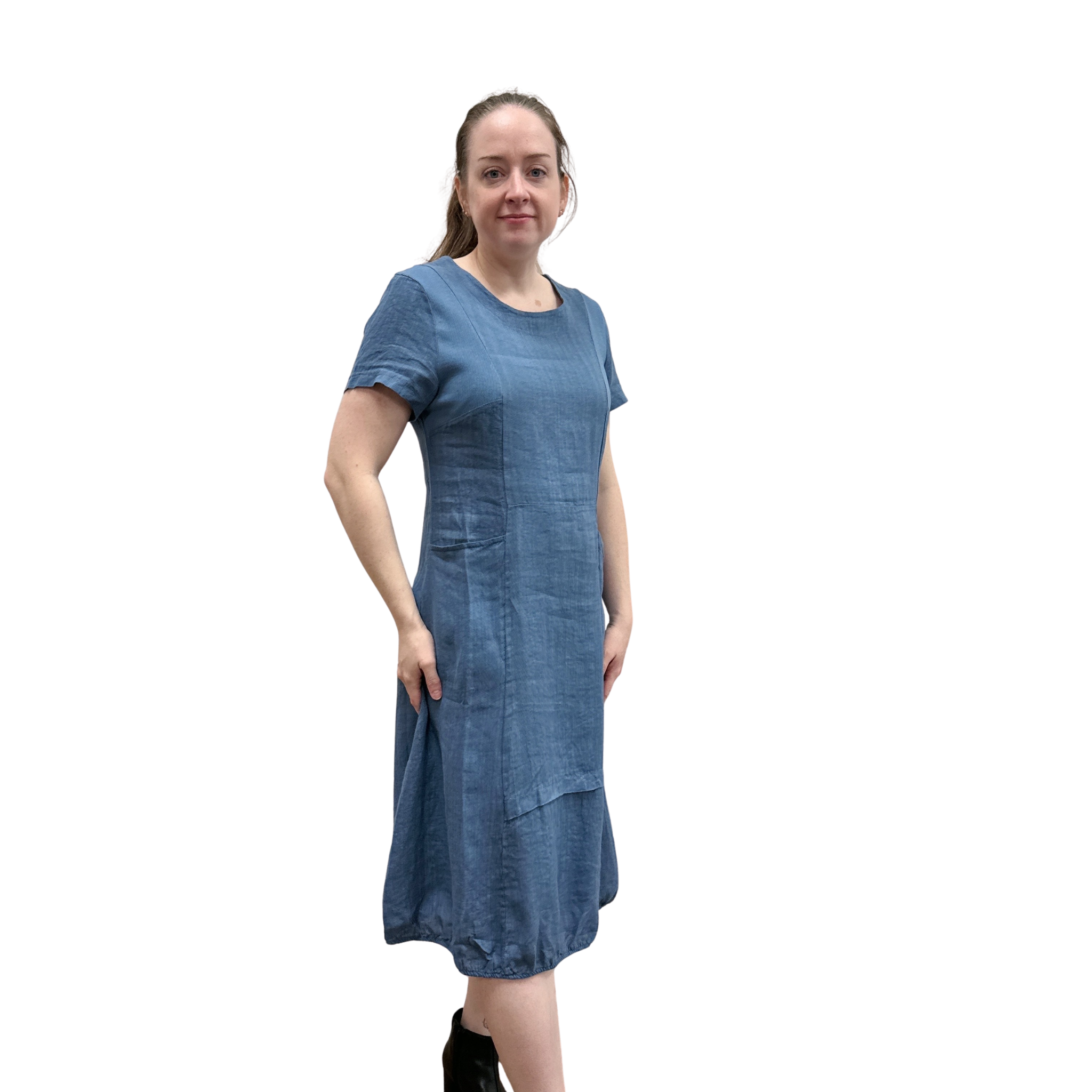 Woman wearing a blue dress on a white background