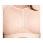 Beige bra with mesh detailing on a white background