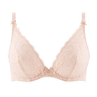 Aubade Rossence Plunge bra in Nude worn against a white background. 