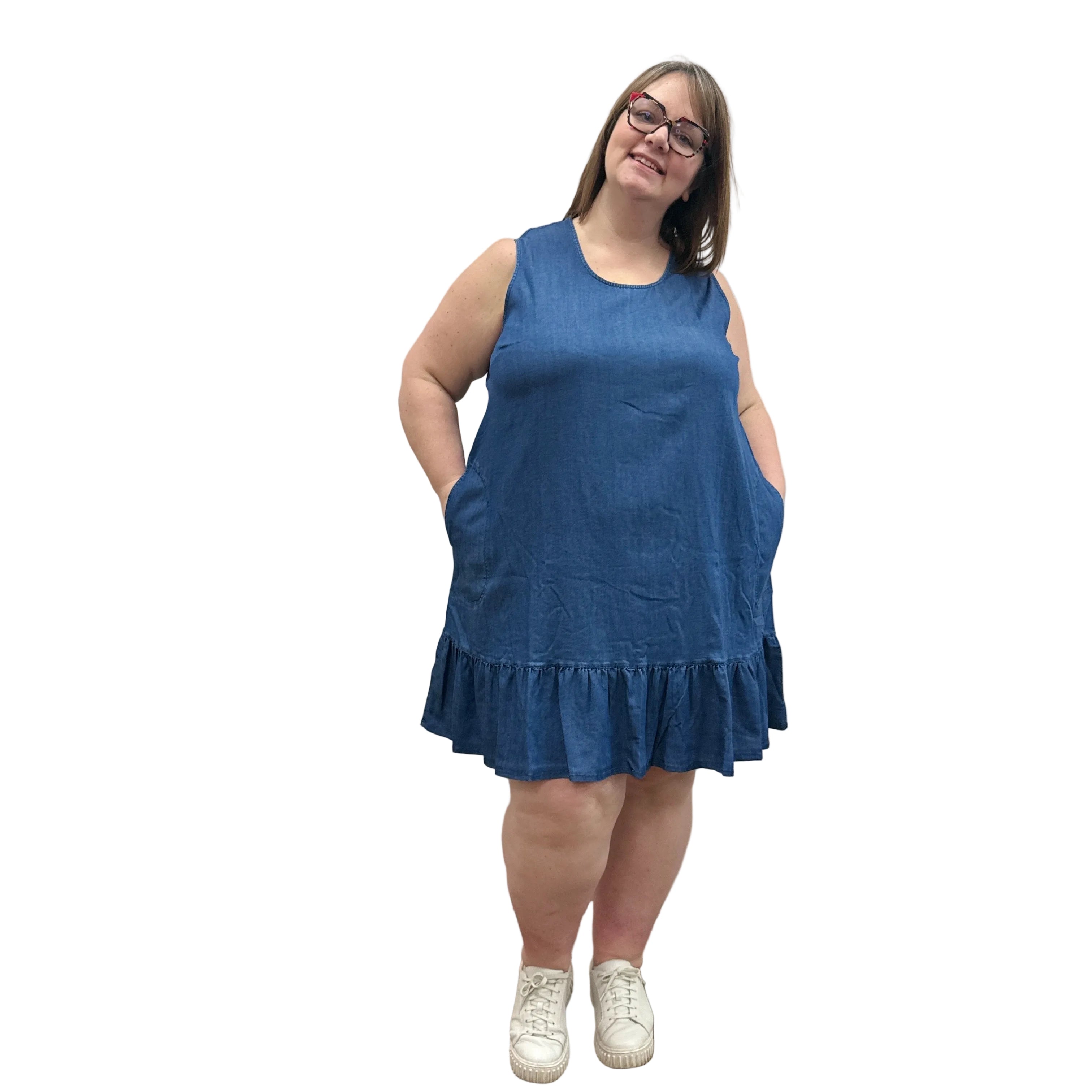 Woman wearing a Denim Blue Sky Lali Dress on white background. 
