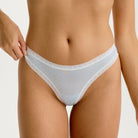 Micro Thong in Blue Pearl panty on model showing front view. 