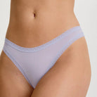 Micro Thong in Lilac Mist light purple panty on model showing the front view. 