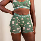Green bralette and shorts set with coffee-themed design and 'Devon + Lang' branding.