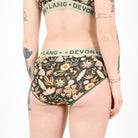 Floral-patterned underwear with 'Lang & Devon' branding on a plain background
