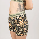 Floral patterned underwear with visible branding on a plain background