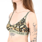 Floral-patterned bra with 'Devon + Lang' branding on a plain background