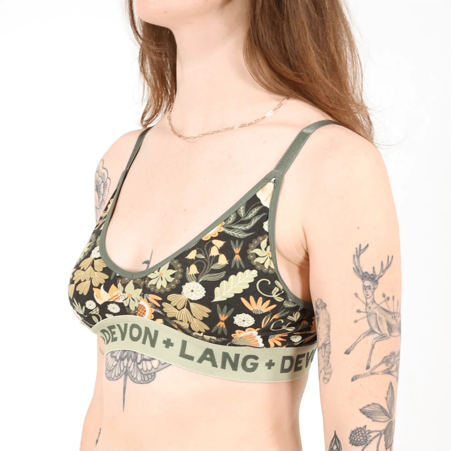 Floral-patterned bra with 'Devon + Lang' branding on a plain background
