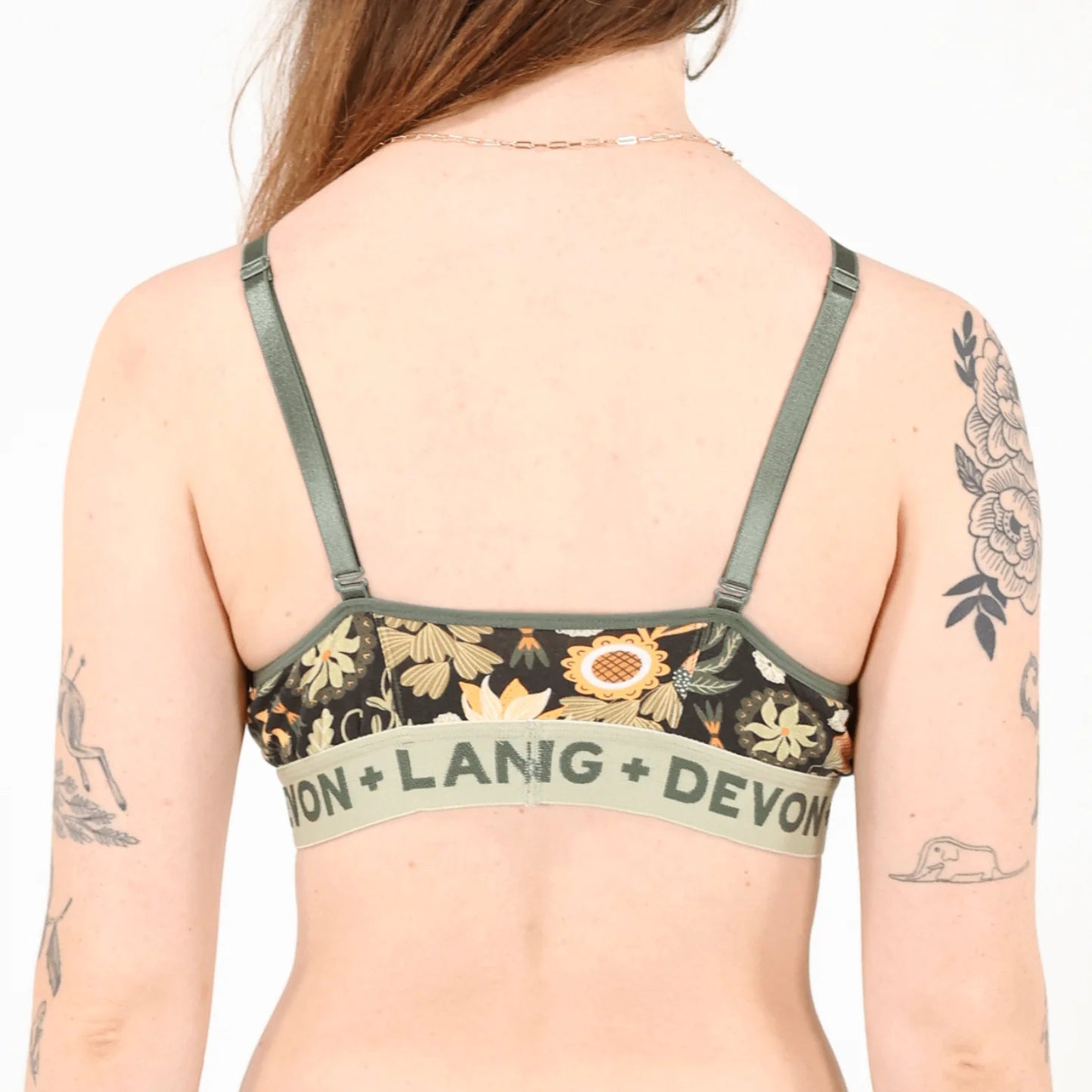 Floral-patterned bra with 'Devon + Lang' branding on a plain background