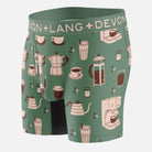 Green boxer briefs with coffee-themed pattern on a white background