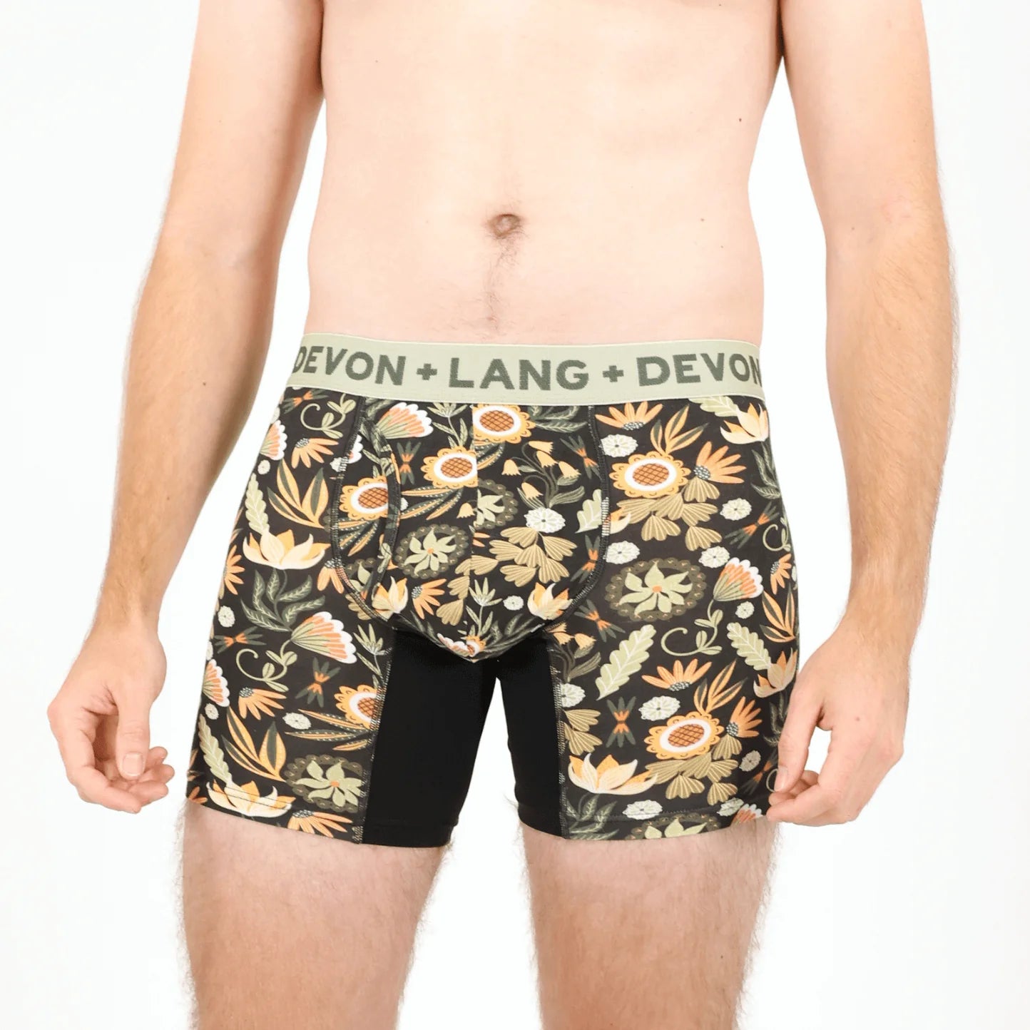 Floral-patterned men's underwear with 'Devon + Lang' waistband on a white background