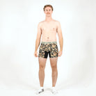 Man wearing a floral patterned underwear on a white background