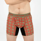 Red plaid boxer briefs with green waistband featuring 'Devon + Lang' brand on a white background.