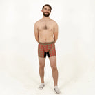 Man wearing plaid underwear on a white background