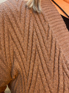 Close-up of grey textured fabric with a blurred background