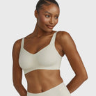 Beyond Bra in Aloe, light sage green wirefree bra shown on a model front view. 