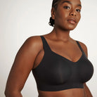 The Beyond Bra in Black, wirefree bra shown on a model. 