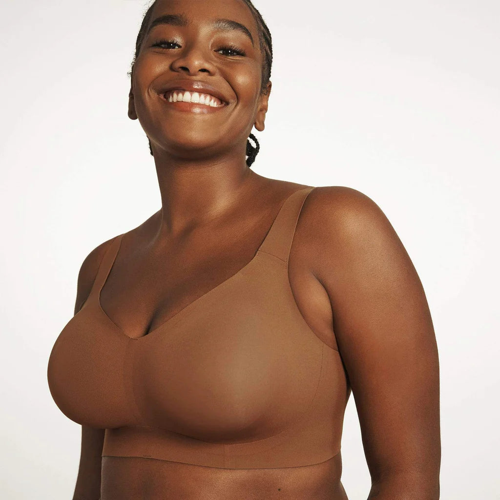 Beyond Bra in Clay, brown wirefree bra shown on a model from the front view. 