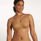 Beyond Bra in Mica, light tan wirefree bra shown on a model from the front view. 
