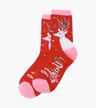 Red socks with reindeer design and 'Lighten Up!' text on a white background