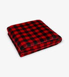 Red and black checkered blanket on a white background