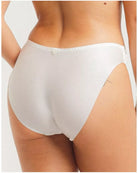 White underwear worn by a person on a plain background