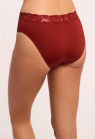 Red underwear with lace waistband on a plain background