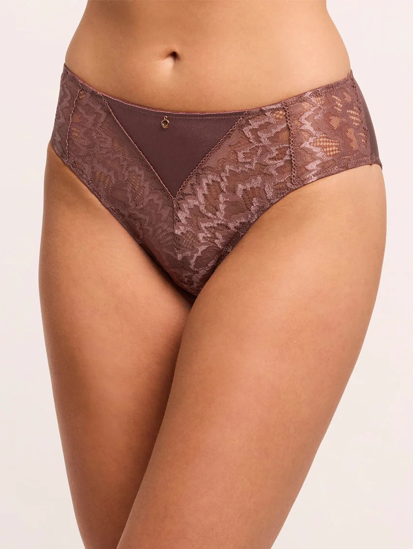 Brown lace underwear on a plain background
