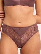 Brown lace lingerie set on a neutral background