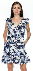 Woman wearing a floral dress with blue and white flowers on a white background