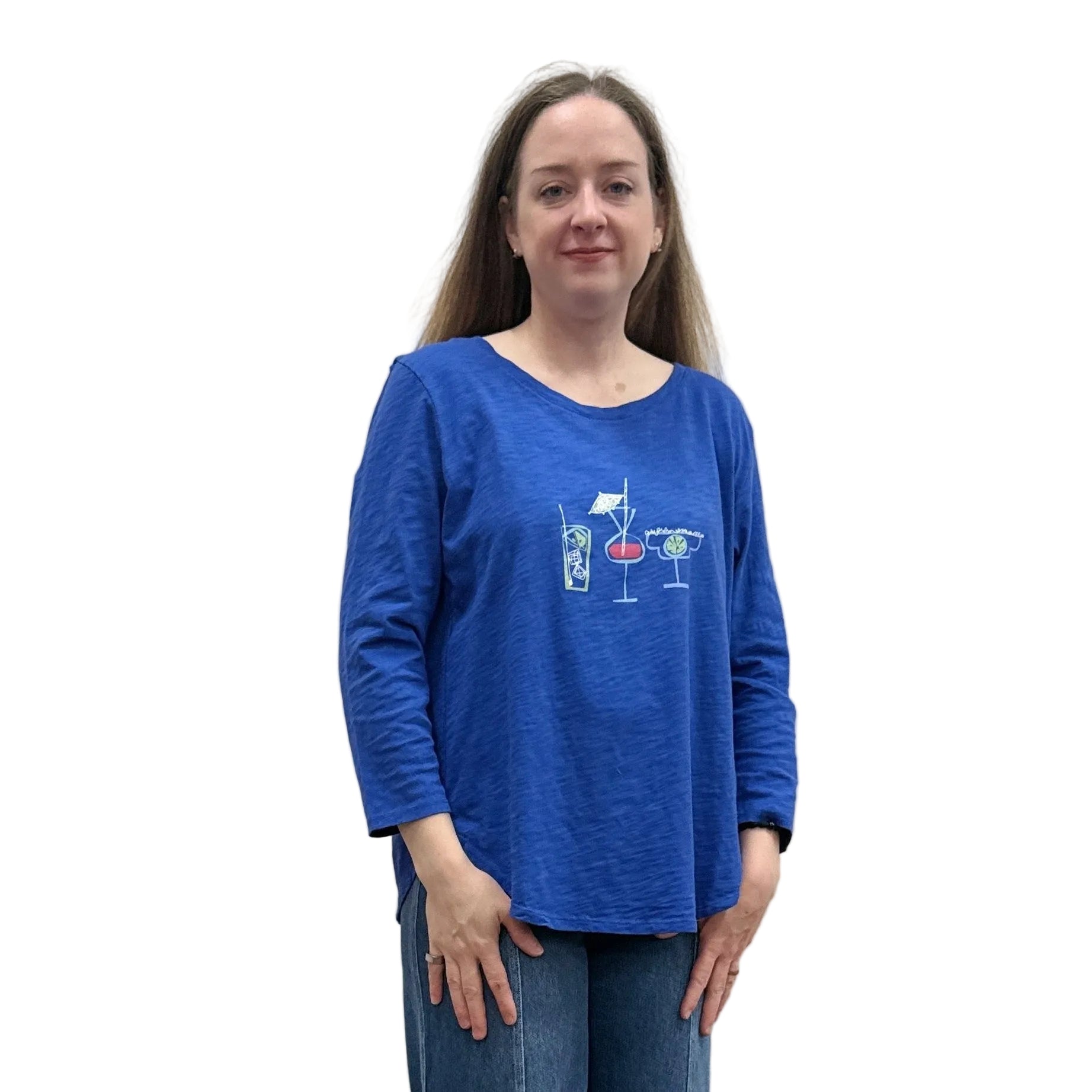 Person wearing a blue Papa High Low longsleeve top and jeans on a white background. 