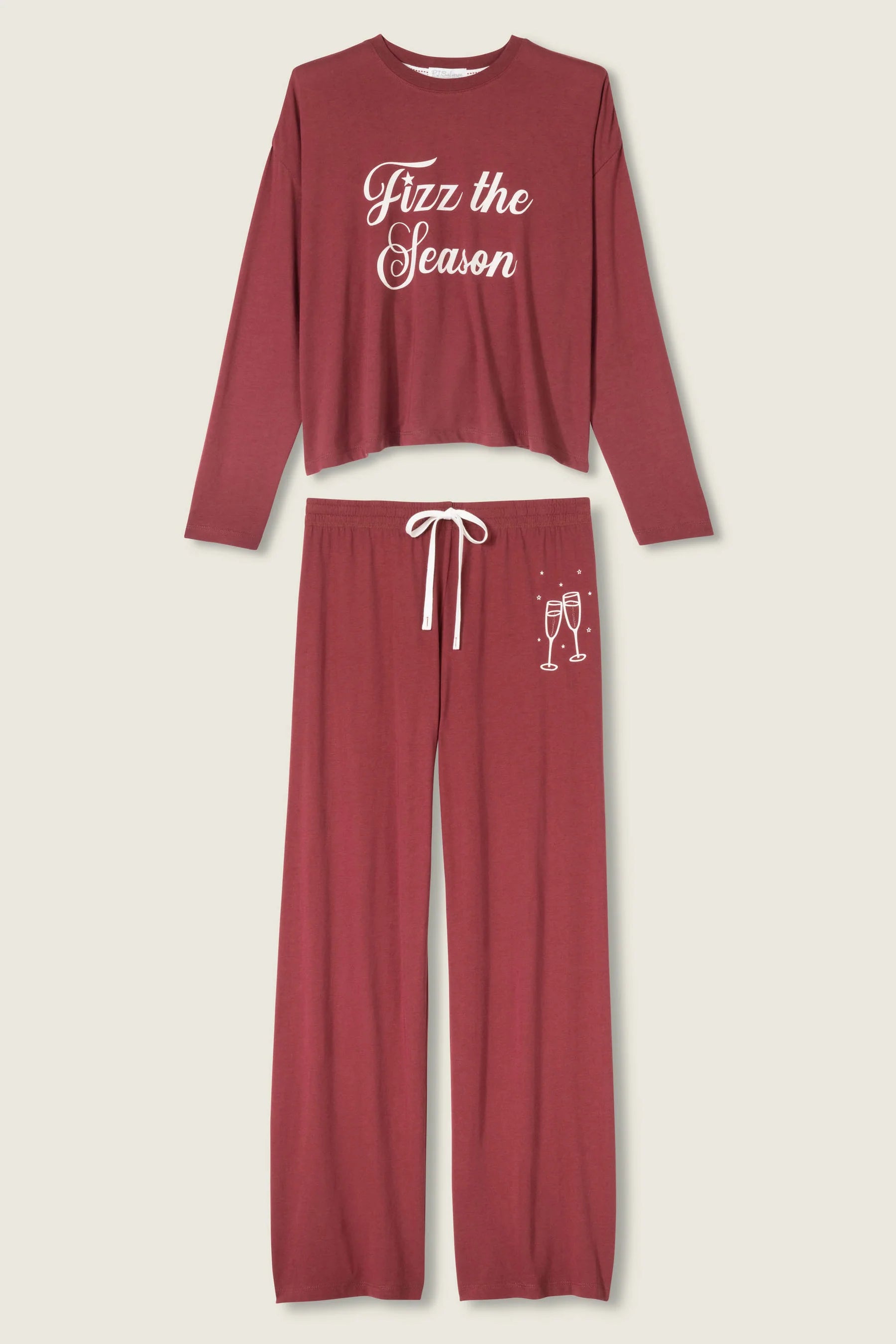 Burgundy pajama set with 'Fizz the Season' text on a white background