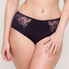 Navy blue underwear with lace trim on a plain background