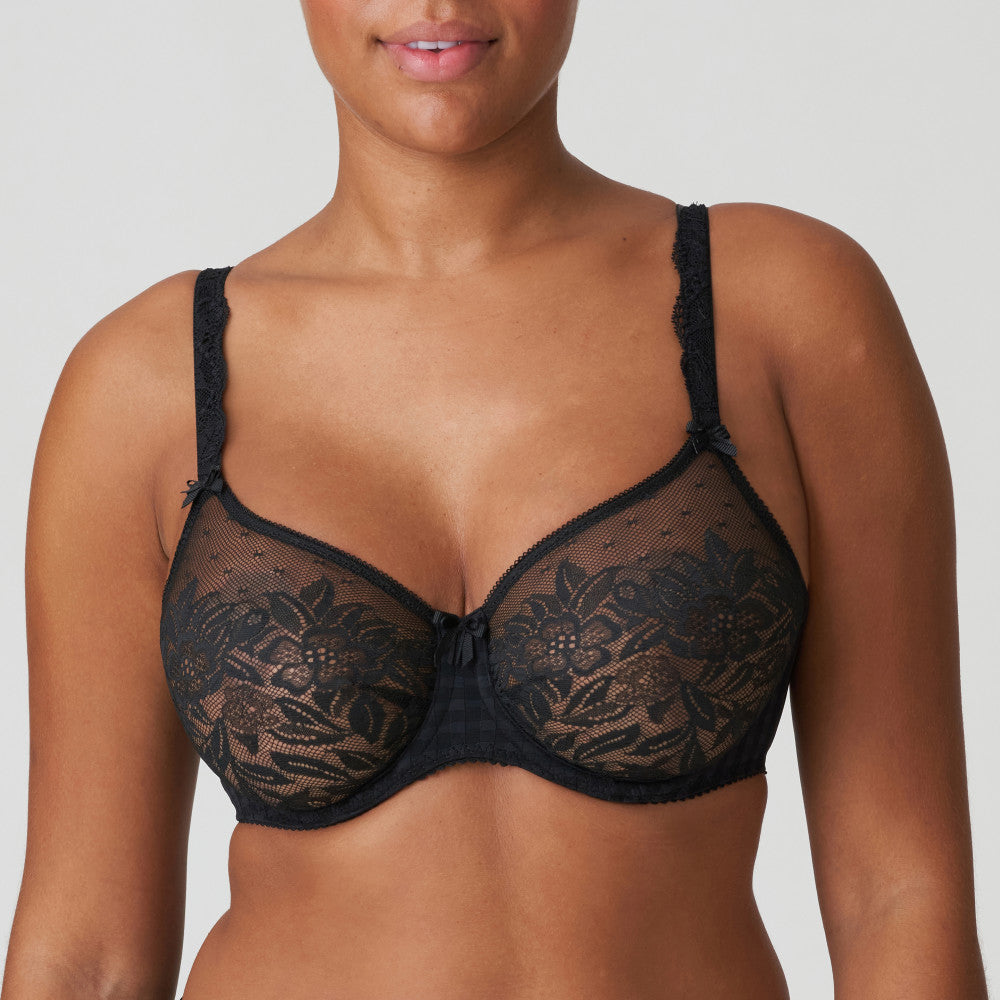 PrimaDonna Madison Seamless Bra in Black shown on a model against a white background. 