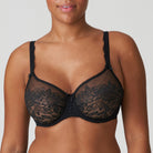 PrimaDonna Madison Seamless Bra in Black shown on a model against a white background. 