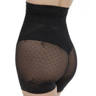 Janira Silueta Secrets Shapewear with Thigh coverage in black shown on a model against a white background, back view. 