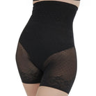 Janira Silueta Secrets Shapewear with Thigh coverage in black shown on a model against a white background. 
