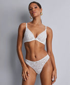 Aubade Rosessence Plunge bra in Opal shown on model against white background. 