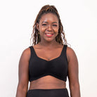 Blue Sky Clipper Top in Black shown on a model against a white background. 