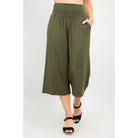 Blue Sky Gaylene Capri in Khaki shown on a model against a white background, from the front view. 